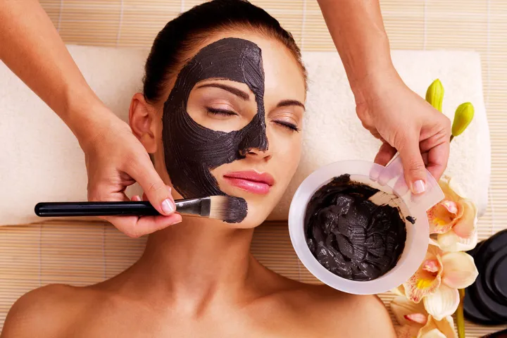 Woman relaxes with a face mask in the beauty area of the spa at the Grand Hotel Binz on Rügen.